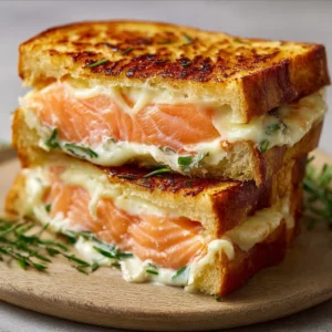 Delicious Salmon Croque-Monsieur with creamy Boursin cheese, ready in 15 minutes.