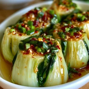 Bok Choy with Ginger Chili Sauce served in a bowl, garnished with chili flakes