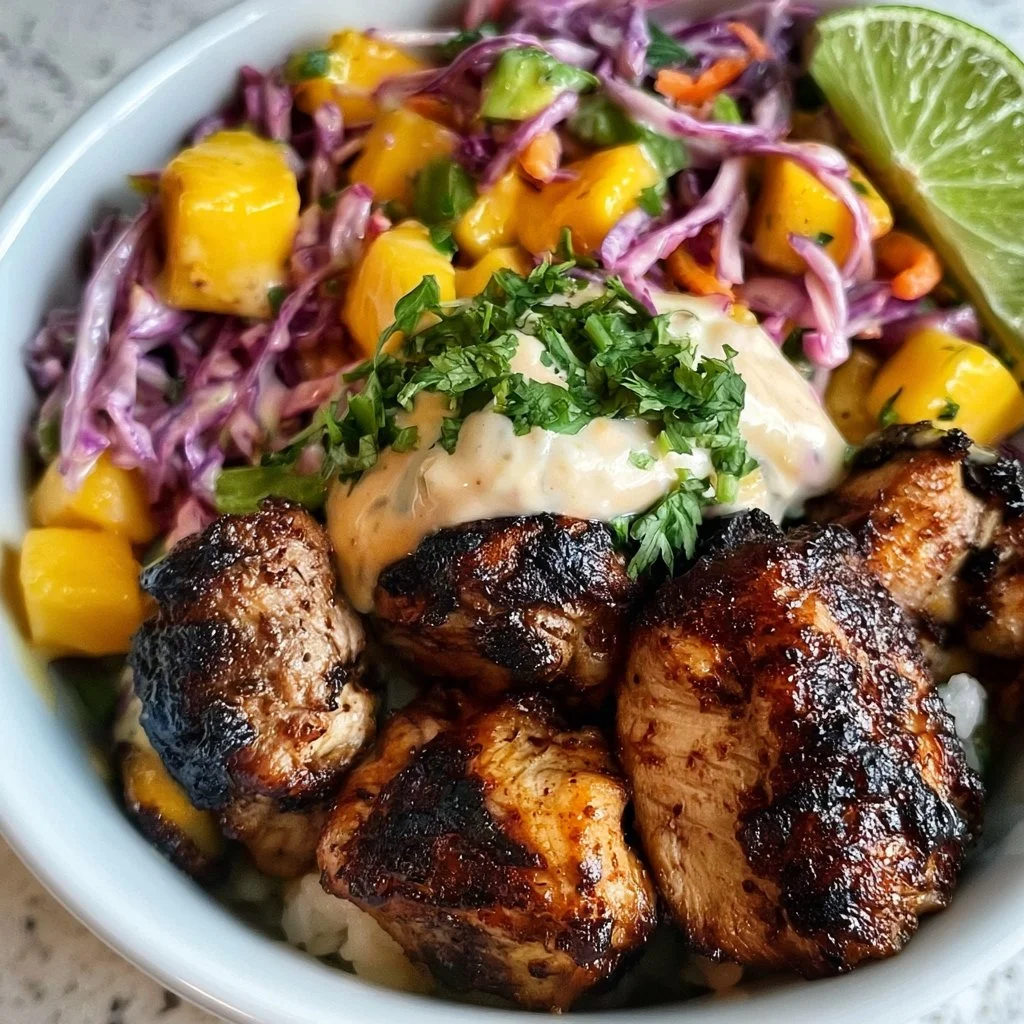 Jerk Chicken & Mango Slaw Bowls with Honey Lime Cream