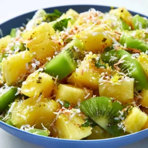Delicious Pineapple Kiwi Salad with fresh fruits in a bowl